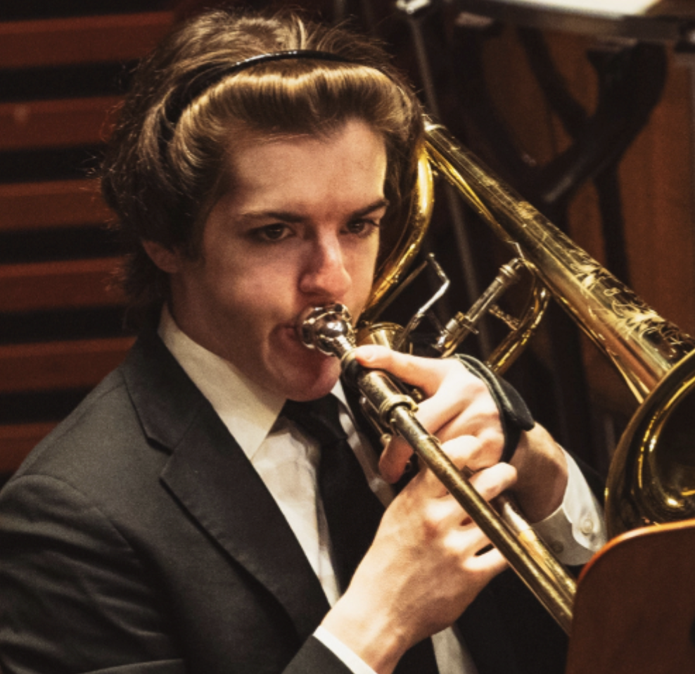 Close-up photo of a UCF trombone player in action